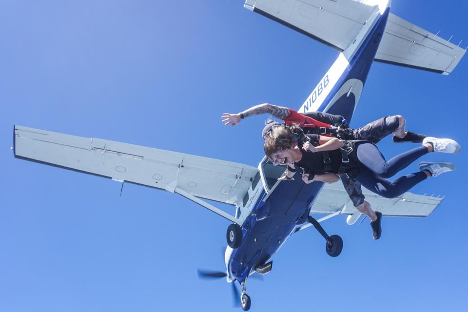 skydiving-birthday-party-girl-jumping-at-skydive-carolina