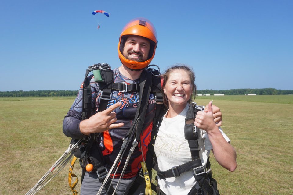 tandem-skydiving-smiling-with-eli-after-landing